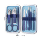 Professional Scissors Nail Clippers set including nail clippers, scissors, and tools in a compact case.
