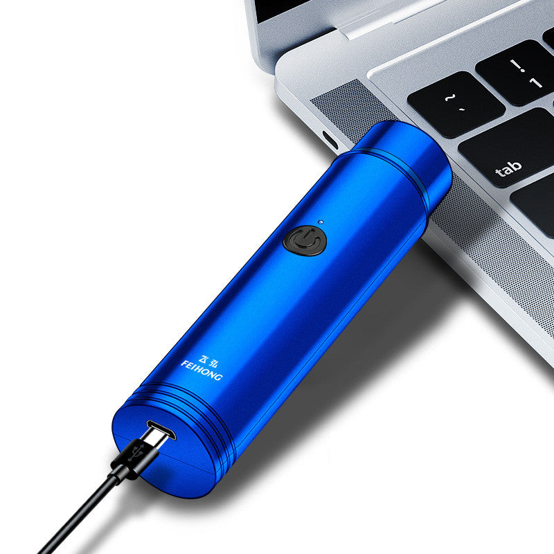 Mini Electric Shaver Portable Car Rechargeable Shaver in blue color plugged into a laptop.