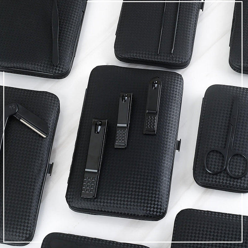 Professional Scissors Nail Clippers set displayed on a black textured background, featuring clippers and tools for nail care.