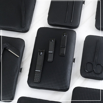 Professional Scissors Nail Clippers set displayed on a black textured background, featuring clippers and tools for nail care.